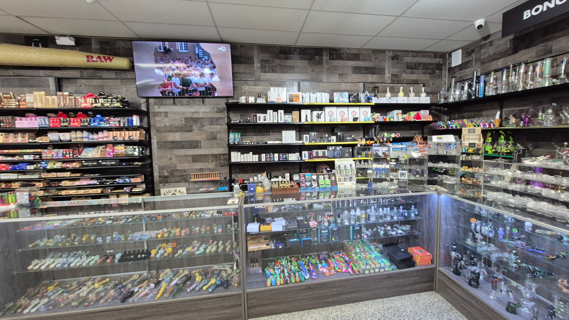 Display cases full of hand pipes and glass