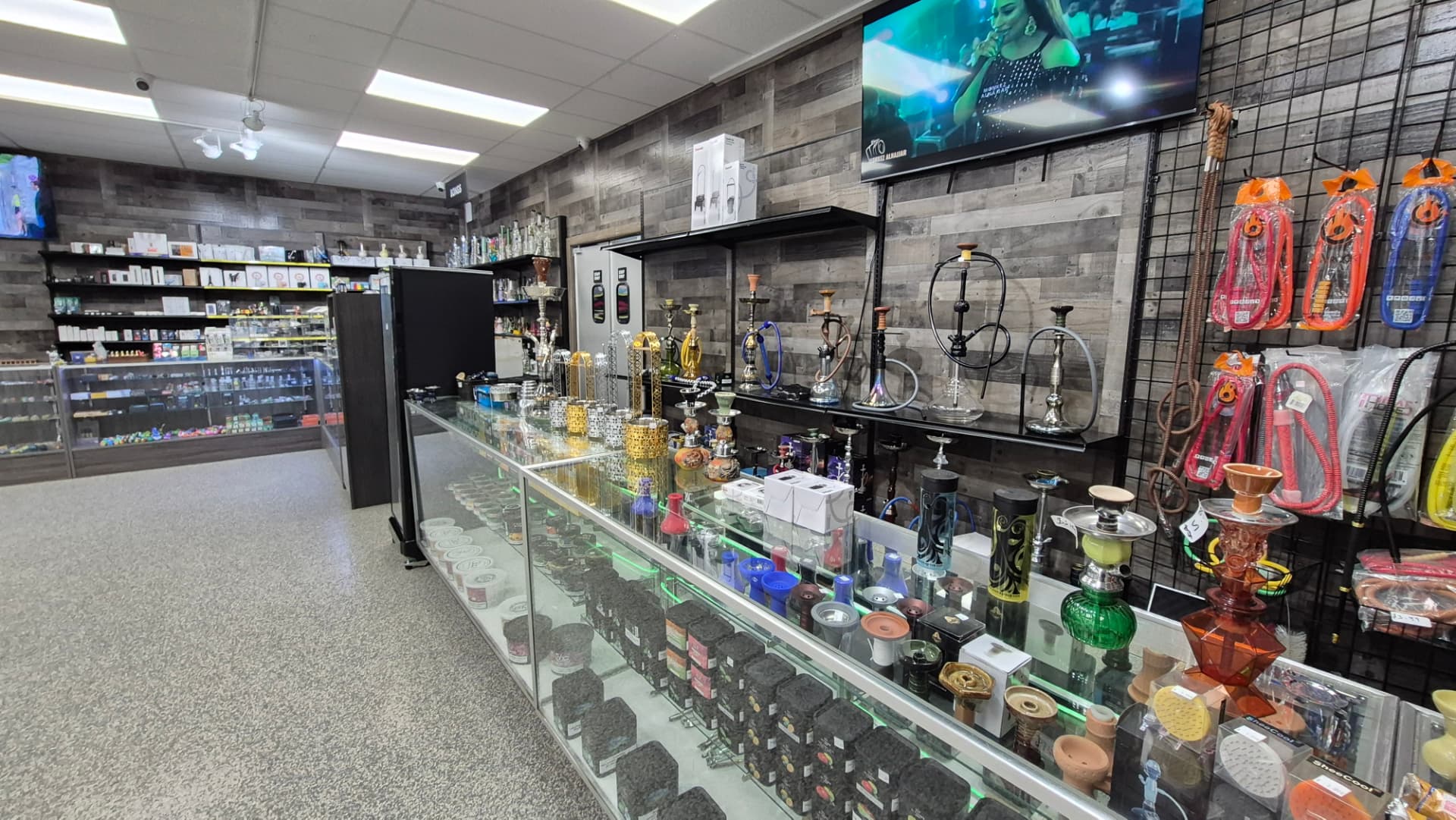 Interior of The Hub smoke shop showing hookahs and display cases