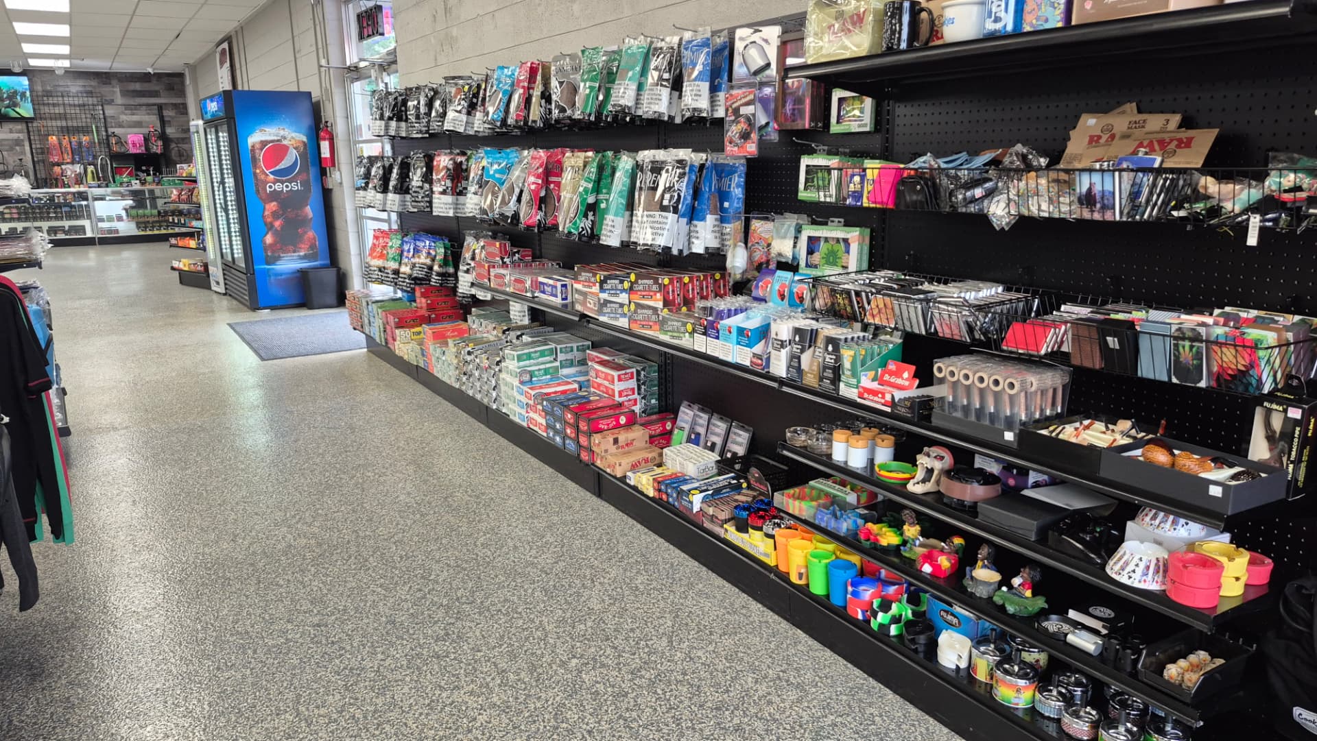 Shelves of rolling papers, wraps, cigarette tubes and ashtrays